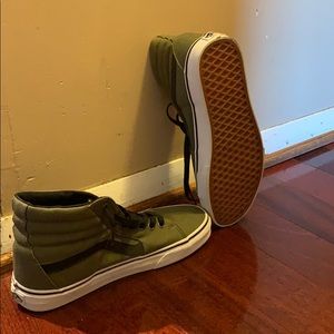Black and green high top vans
